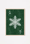 Rustic holiday snowflake artwork in deep green tones