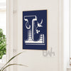 Personalized floral monogram wall art featuring a detailed white letter 'L' with botanical elements on a navy blue background, displayed in a frame