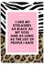 Leopard print quote wall art with pink centre reading “I like my eyelashes as black as my soul” in bold black typography.
