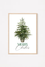 Framed artwork with a Christmas tree and 'Merry Christmas' text on a white background