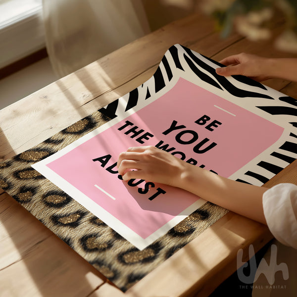 Pink motivational wall art reading “Be You The World Will Adjust” with leopard print and bold zebra pattern details.