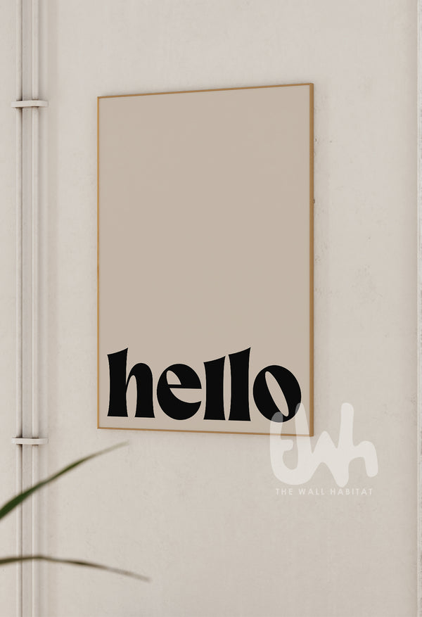 Framed artwork with 'hello' text on a neutral wall.