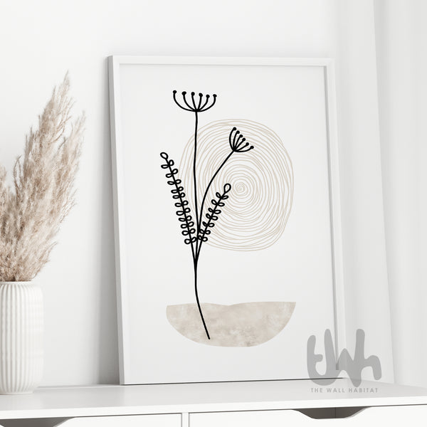 Framed neutral botanical line art print styled on a white cabinet with dried pampas grass – soft modern home décor