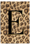 Leopard print background with a large black letter 'E' in the center