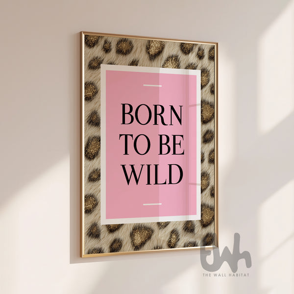 Born to be wild pink leopard print wall art framed in a modern interior