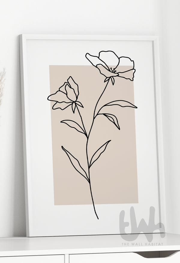Minimalist botanical line art print featuring two abstract flowers drawn in black continuous line style over a neutral beige background, framed and styled for modern interior decor