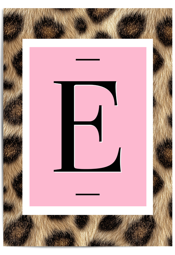 Personalised pink leopard initial wall art print featuring a bold letter on a blush background in a gold frame.