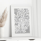 grey wall art with leaves