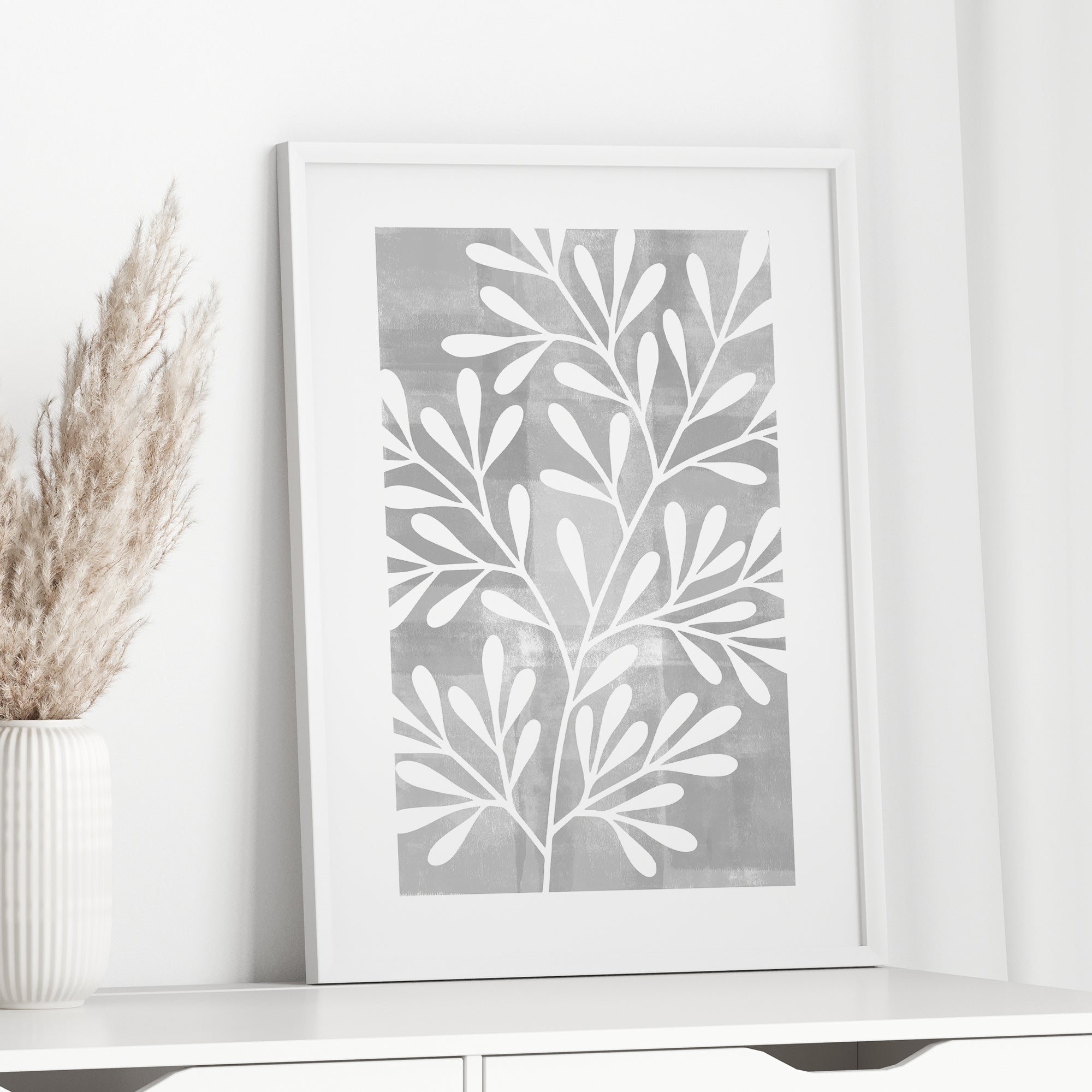 grey wall art with leaves