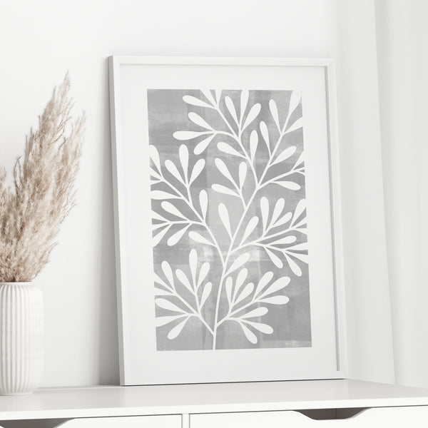 grey wall art with leaves