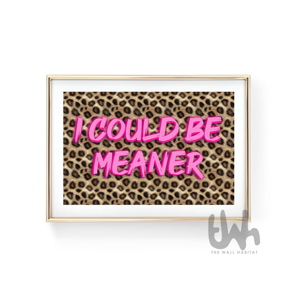 Pink leopard print wall art with bold typography reading “I Could Be Meaner”, displayed in a modern glam interior.