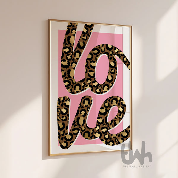 Pink leopard print wall art featuring the word love in bold leopard typography, modern fashion inspired home decor print