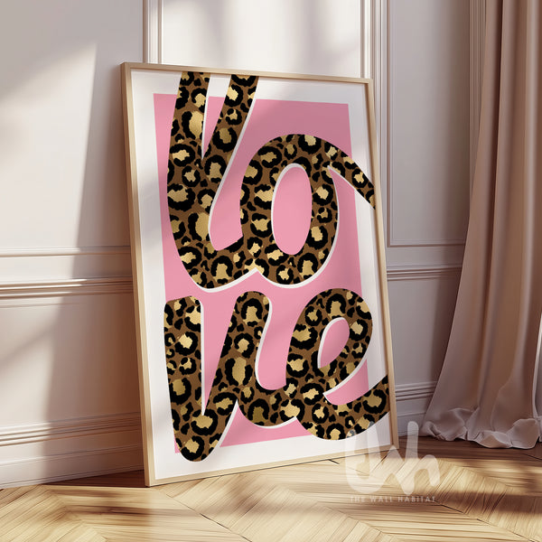 Pink leopard print wall art featuring the word love in bold leopard typography, modern fashion inspired home decor print