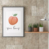 Nice Bum peach printable bathroom wall art displayed beside shower
