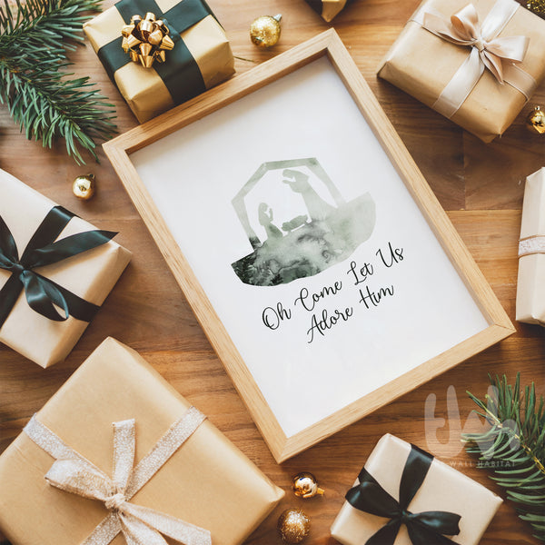 Framed Christmas art print with presents and decorations on a wooden surface