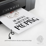 Funny Christmas bathroom printable emerging from a home printer featuring vintage Santa and black typography