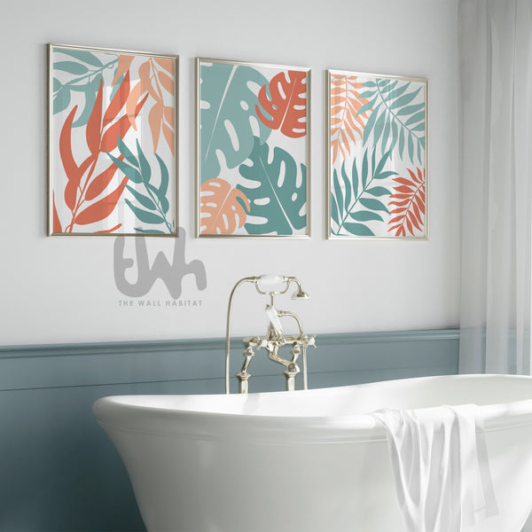 Set of 3 tropical botanical wall art prints in coral peach and teal, featuring modern leaf illustrations with a coastal and boho aesthetic – perfect for living room, bedroom, or office decor.