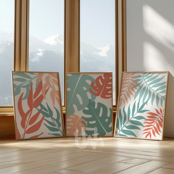Set of 3 tropical botanical wall art prints in coral peach and teal, featuring modern leaf illustrations with a coastal and boho aesthetic – perfect for living room, bedroom, or office decor.