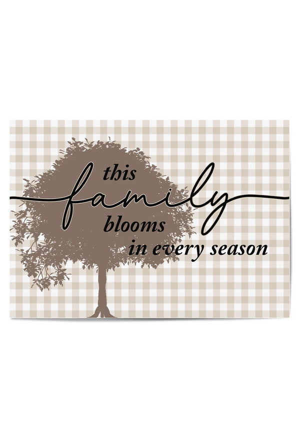 Decorative sign with tree design and text on a checkered background