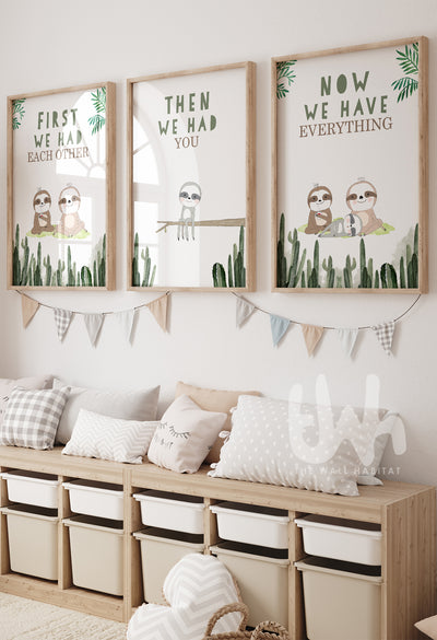 Set of three nursery wall art prints featuring cartoon sloth family with phrases: ‘First we had each other’, ‘Then we had you’, and ‘Now we have everything’ on jungle-themed backgrounds