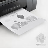 Grey elephant family quote nursery printable emerging from a home printer