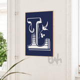 Personalized floral monogram wall art featuring a detailed white letter 'L' with botanical elements on a navy blue background, displayed in a frame