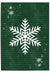 White snowflake wall art on forest green textured background