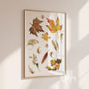 Hand-painted watercolour autumn leaves wall art print in brown, orange, yellow and green tones on a white background – rustic fall-themed poster for seasonal home decor.
