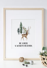 Woodland Christmas bathroom wall art with deer illustration and wash your hands quote in natural oak frame