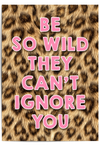 Leopard print background with pink text 'BE SO WILD THEY CAN'T IGNORE YOU'