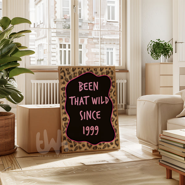 Decorative sign with leopard print border and text in a living room setting