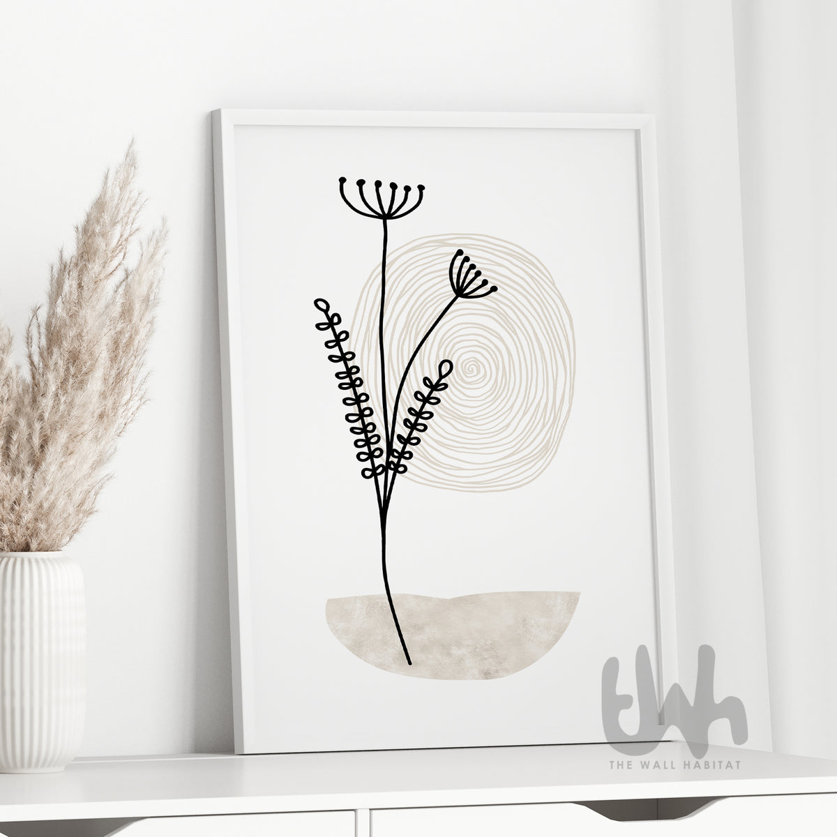 Framed neutral botanical line art print styled on a white cabinet with dried pampas grass – soft modern home décor