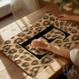 Black initial letter wall art with luxury leopard print background displayed as a modern statement poster