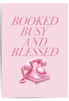 Booked Busy and Blessed pink wall art print with retro telephone illustration styled in a modern living room