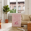 Booked Busy and Blessed pink wall art print with retro telephone illustration styled in a modern living room