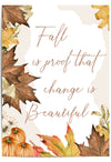 Decorative autumn print with autumn leaves and pumpkins featuring the text 'Fall is proof that change is beautiful'.