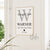 Framed personalized family name wall art print hanging in a bright hallway, with large grey letter W, the names Wendy & Keith, family name Warner, children’s names, and established date