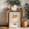 Vintage-inspired fall wall art with watercolor pumpkins, the phrase “Farm Fresh Pumpkins – Locally Grown & Harvested,” styled on a console with rustic fall decor.