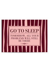 Funny Go To Sleep bedroom wall art with sarcastic quote in burgundy and pink stripes
