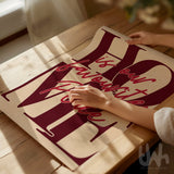 Home Is Our Favourite Place typography poster in deep burgundy and warm beige