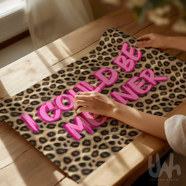 Pink leopard print wall art with bold typography reading “I Could Be Meaner”, displayed in a modern glam interior.