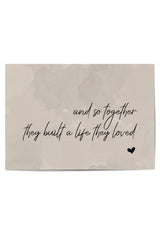 Flat lay of the unframed wall print with romantic message on neutral tones