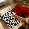 red and black abstract leopard print