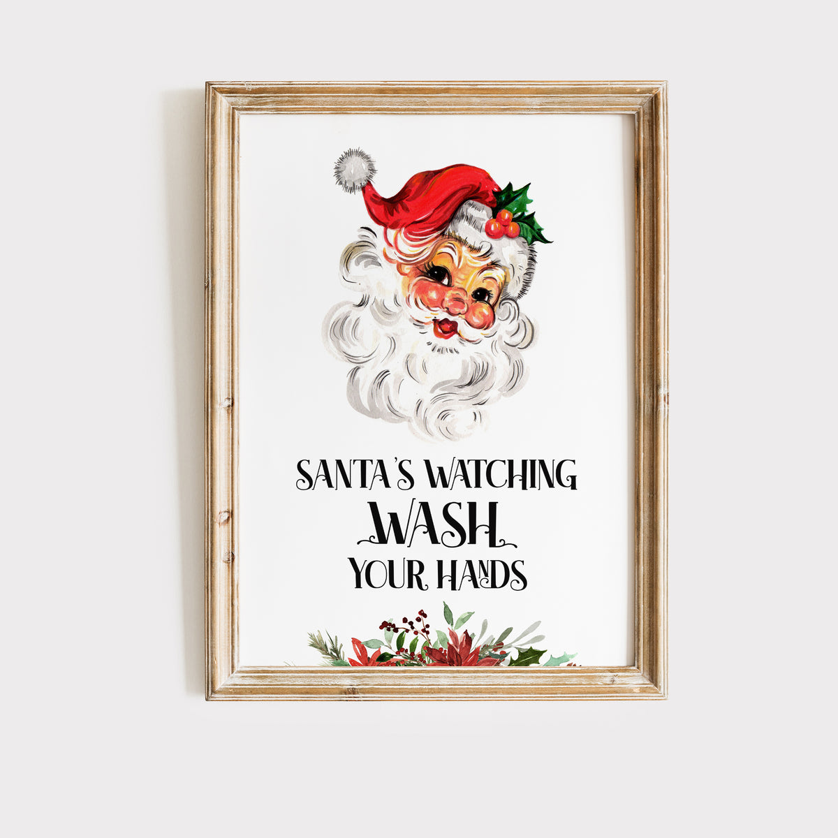 Framed artwork with Santa Claus illustration and text 'Santa's Watching Wash Your Hands' on a white background.