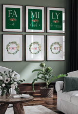 Green Christmas gallery wall set of six displayed in a living room with forest green walls and white furnishings.