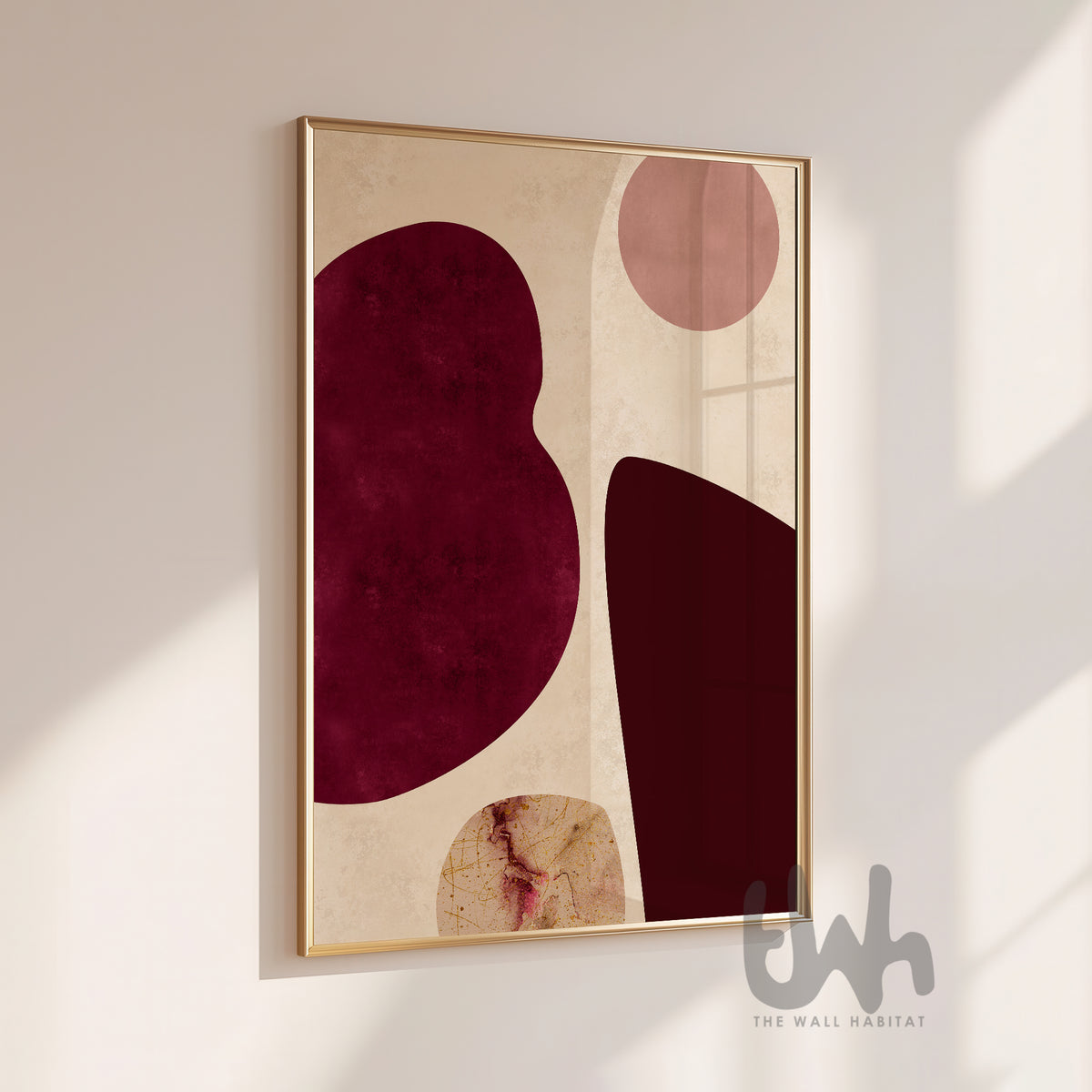 Burgundy and beige abstract wall art displayed in a slim gold frame
