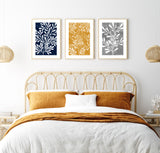 over the bed ochre yellow and blue bedroom prints